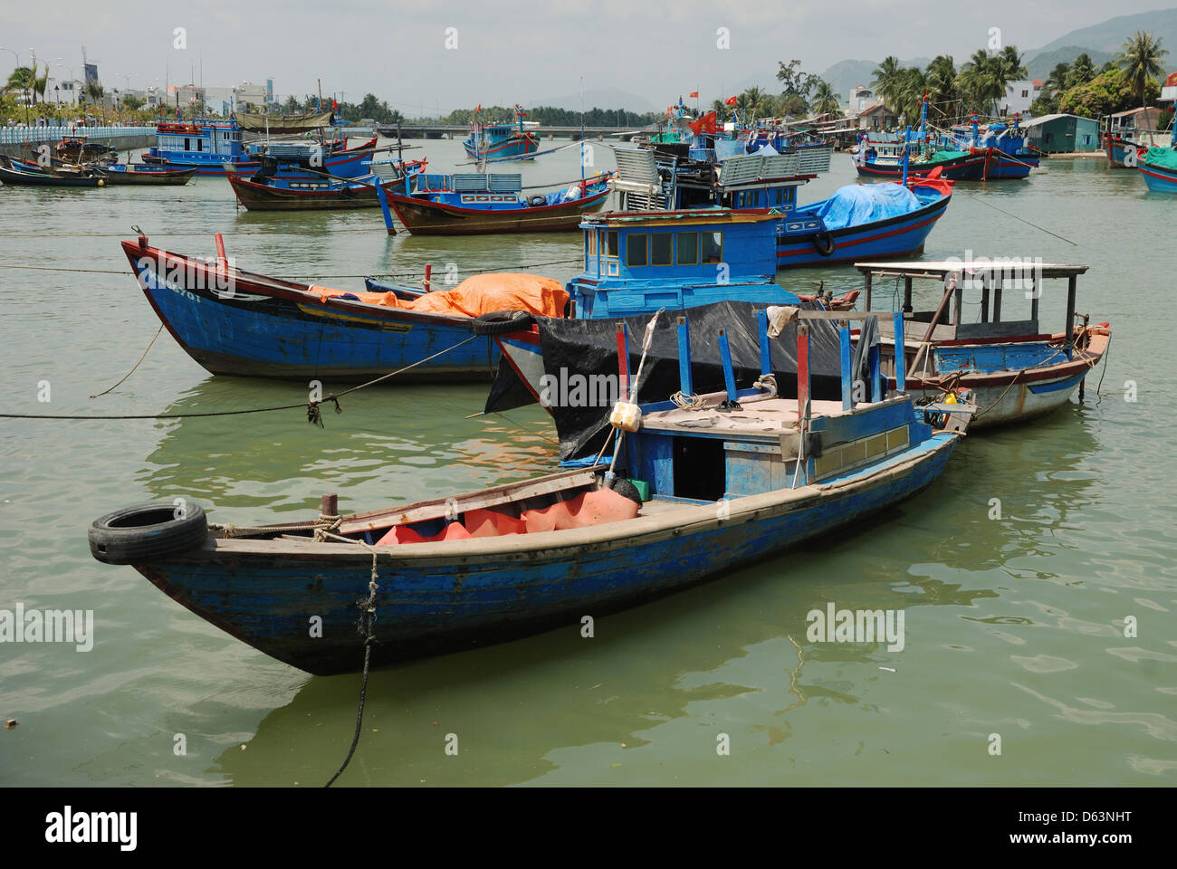 Fishing boats at the harbour at Nha Trang, Vietnam. Stock Photo