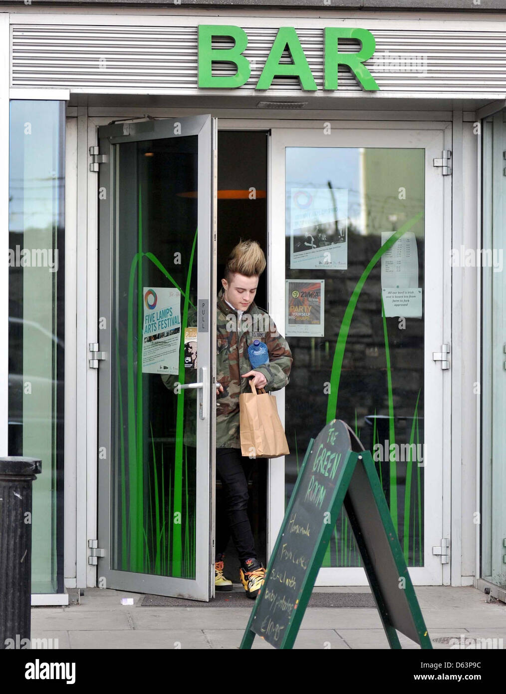 Edward Grimes leaving The Green Room Bar, while on his way to a