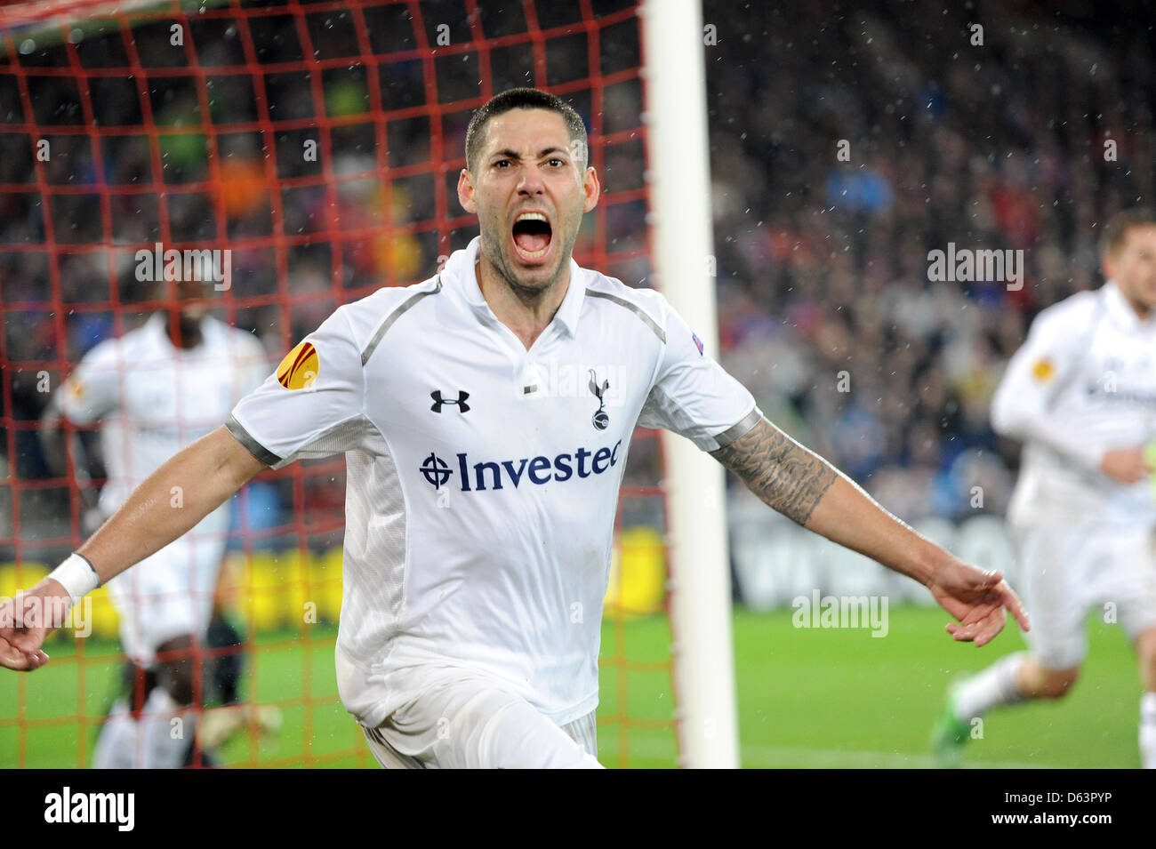 Basel, Switzerland. 11th April 2013. Clint Dempsey of Tottenham Hotspur celebrates his equaliser for 2-2 late in the Europa League game between FC Basel and Tottenham Hotspur from St. Jakob-Park. Stock Photo