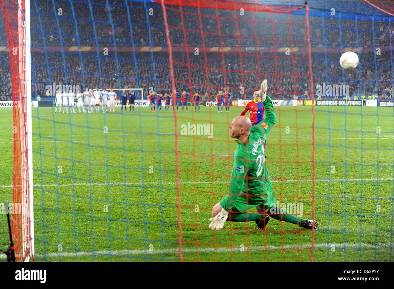 Basel, Switzerland. 11th April 2013. Marcelo Diaz of FC Basel scores the winning penalty in the shootout in the Europa League game between FC Basel and Tottenham Hotspur from St. Jakob-Park. Stock Photo