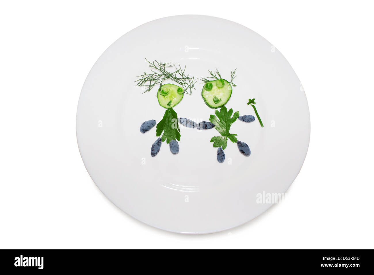 Child silhoutte from cucumber at plate 4154 Stock Photo