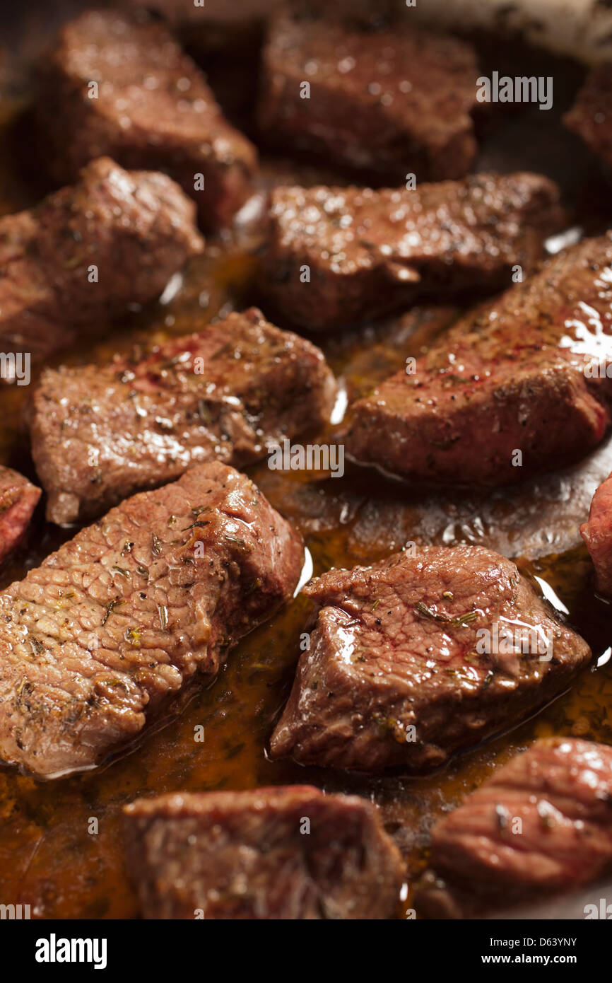 beef browning in a pan Stock Photo