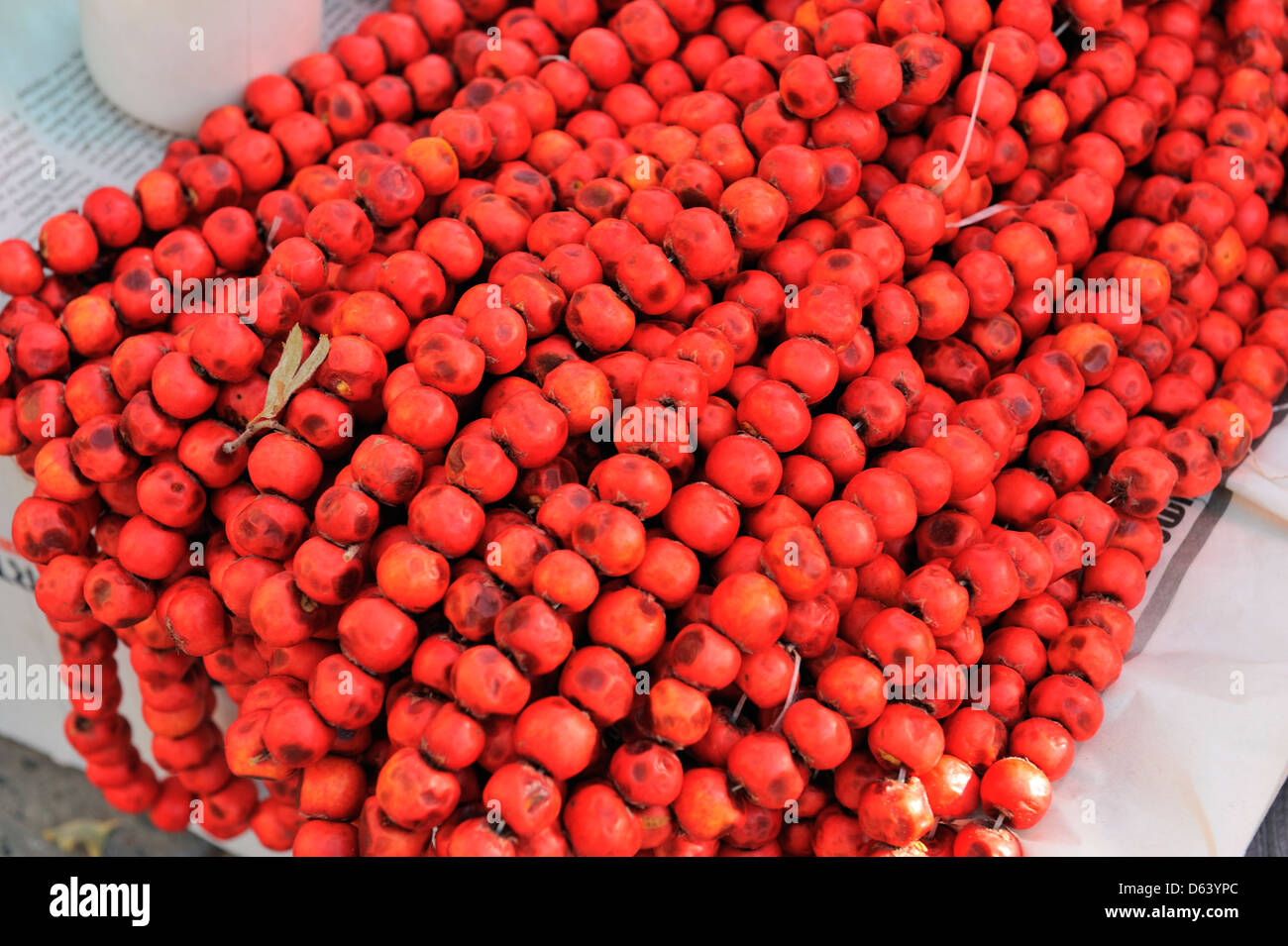 Strings of crabapple fruit in a market stall, Yerevan, Armenia Stock Photo Alamy