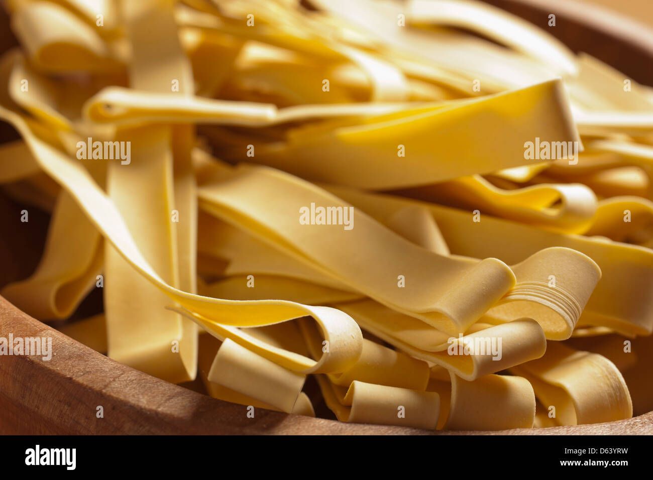 Uncooked egg noodles Stock Photo Alamy