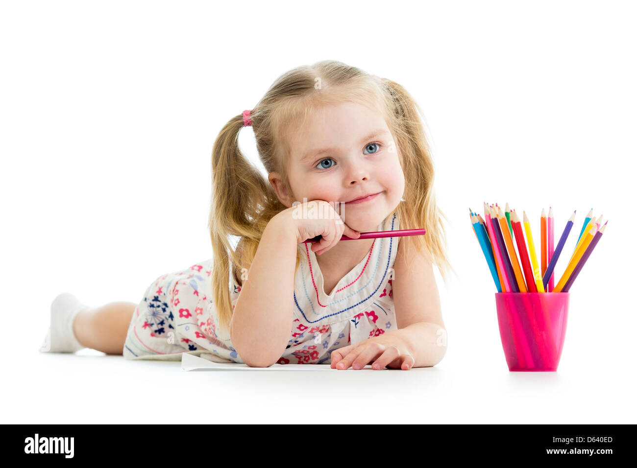 kid girl drawing with colourful pencils Stock Photo