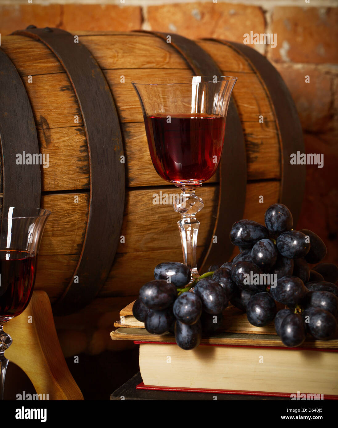 Retro still life with red wine and barrel Stock Photo - Alamy