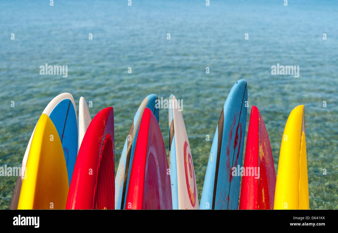 TIps of surf board or surfboards by the side of the sea Stock Photo