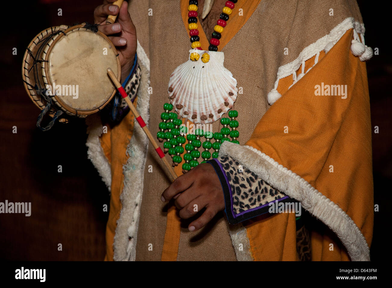 Mayan in Traditional Pre-Hispanic Costume Playing Traditional Drum, Playa del Carmen, Riviera Maya, Yucatan, Mexico. Stock Photo