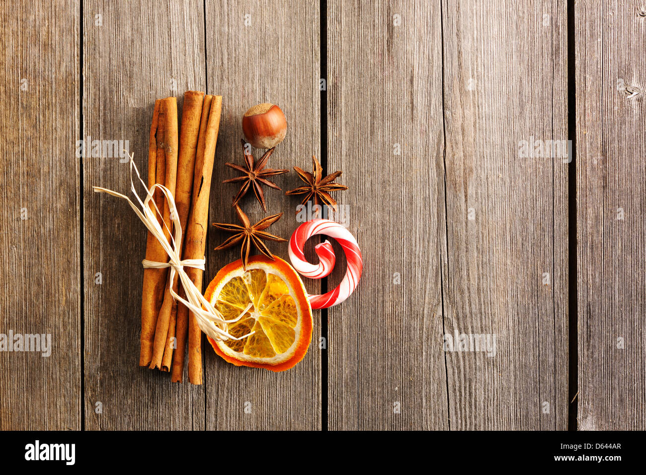 Cinnamon sticks over wooden table Stock Photo Alamy