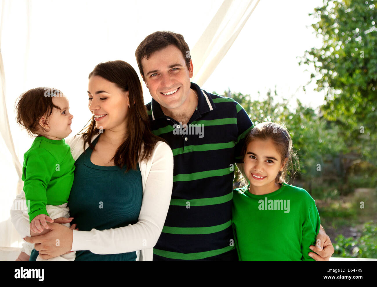Portrait of a happy smiling family Stock Photo - Alamy