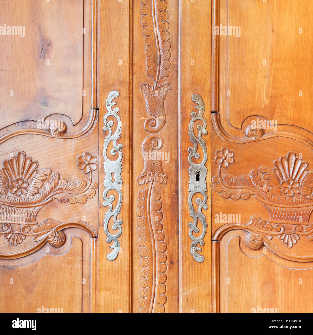 carved wooden door of old wardrobe Stock Photo