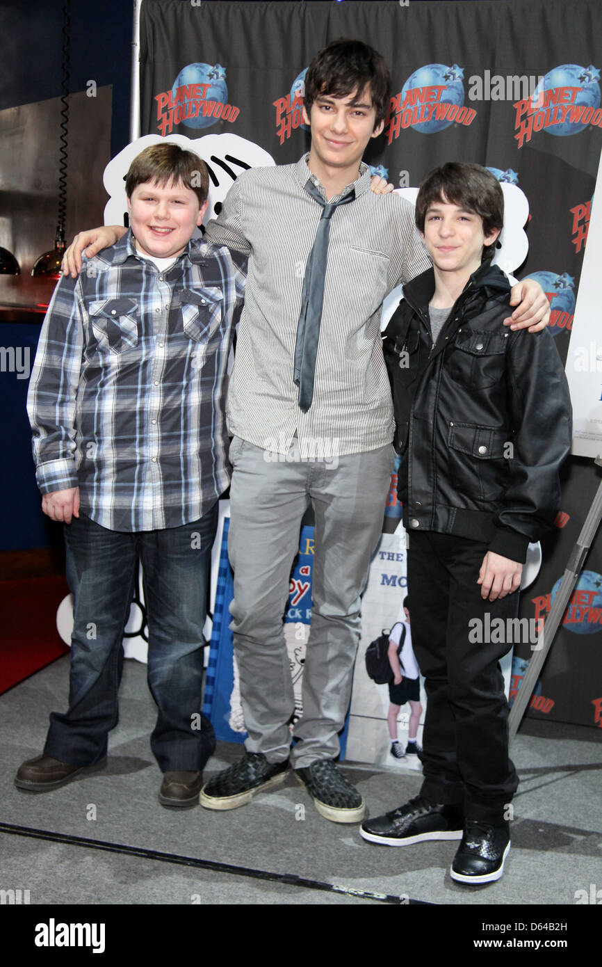 Robert Capron, Devon Bostick and Zack Gordon Stars of 'Diary Of A Wimpy Kid: Rodrick Rules' visit Planet Hollywood Times Square Stock Photo