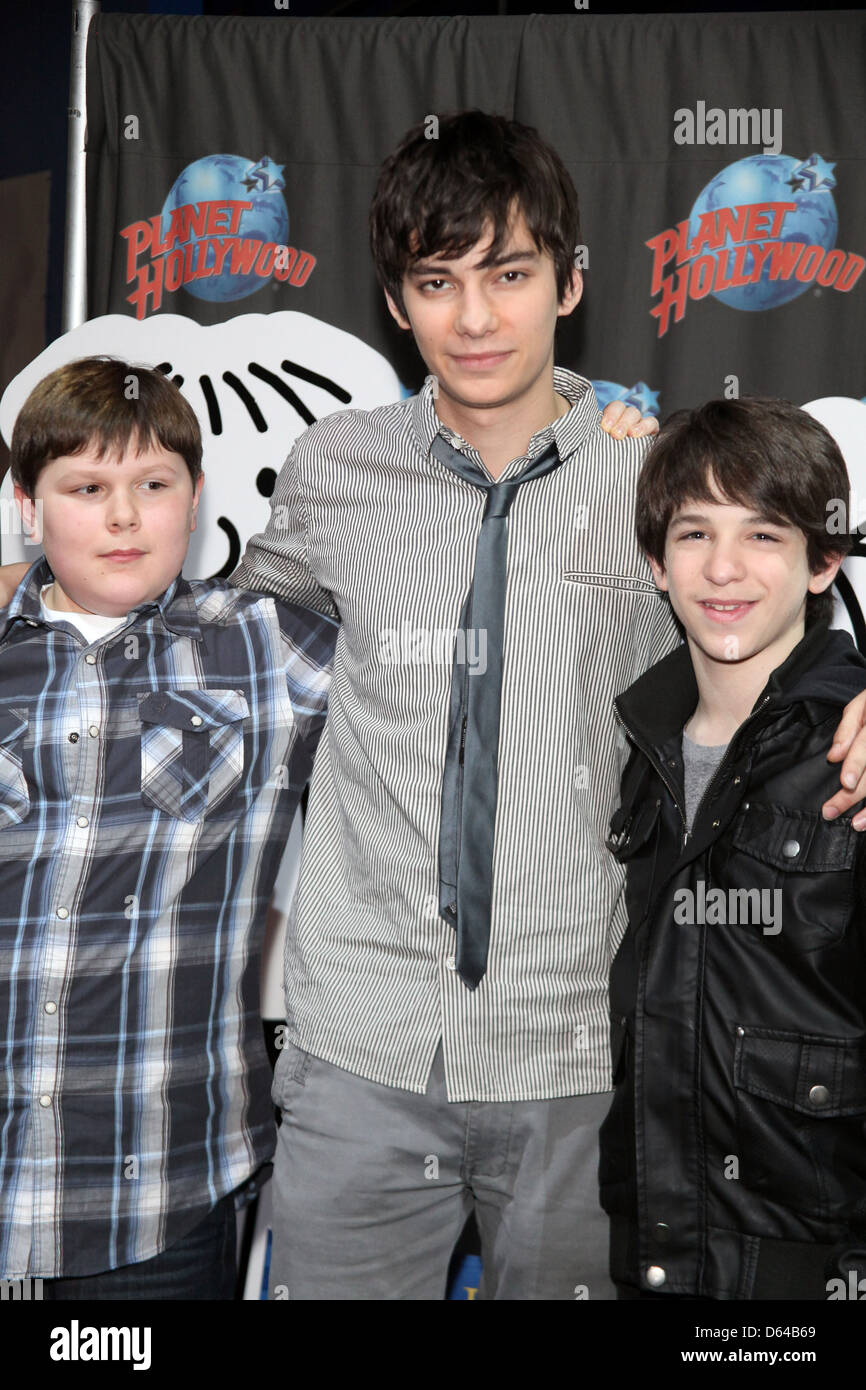 Robert Capron, Devon Bostick and Zack Gordon Stars of 'Diary Of A Wimpy Kid: Rodrick Rules' visit Planet Hollywood Times Square Stock Photo