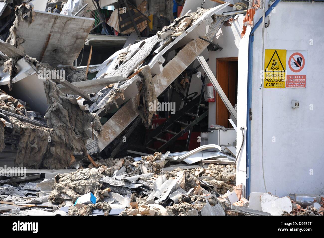 The ruins of a collapsed hall are pictured in Mirabello, Italy, 23 May 2012. An earthquake measuring 6.0 on the Richter scale shook the Italian region Emilia-Romagna early in the morning on 20 May 2012. Photo: Nicolas Armer Stock Photo