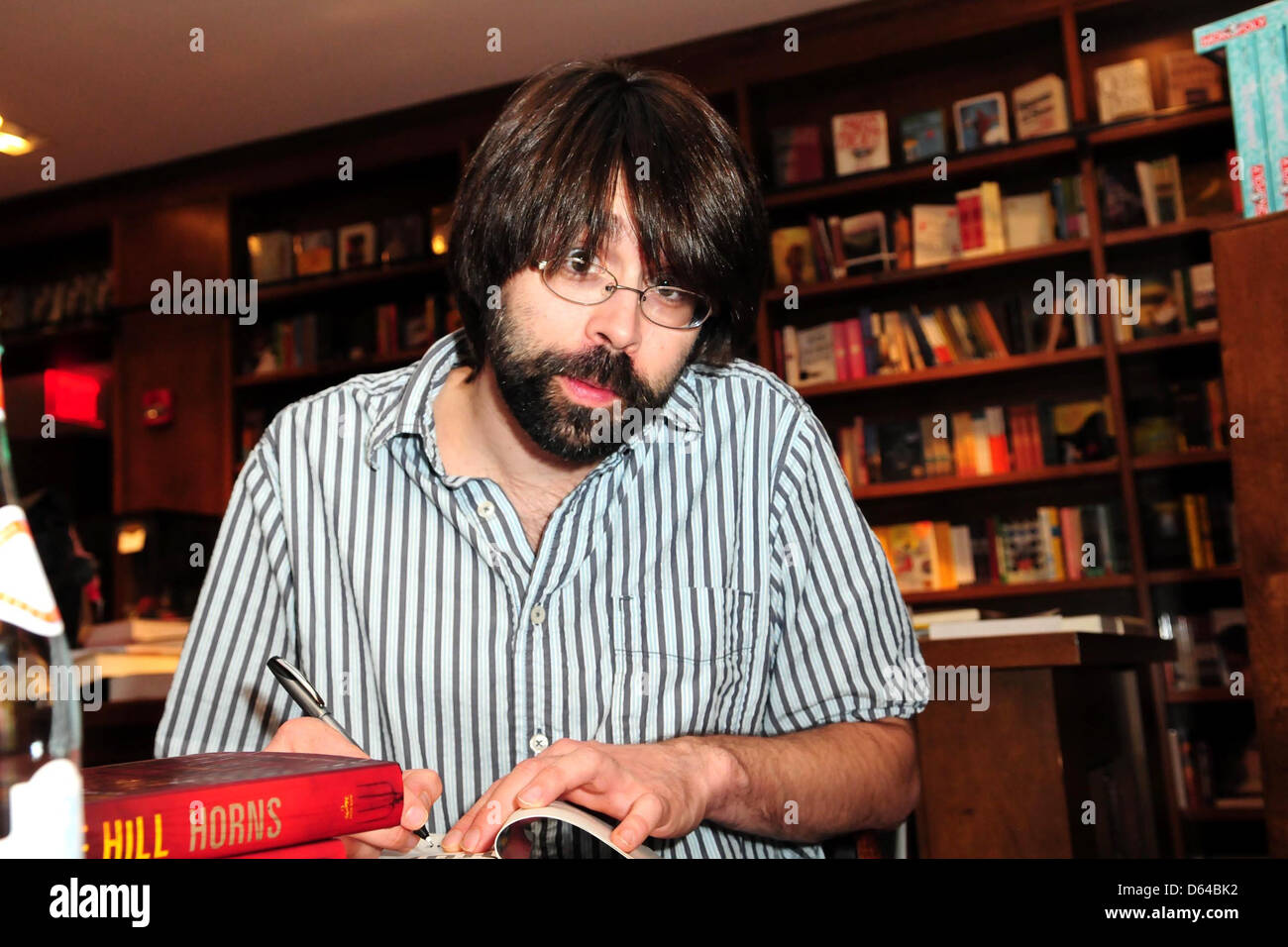 Author Joe Hill signs copies of his new book 'Horns' at Books & Books. Hill born Joseph Hillstrom King is the son of horror Stock Photo
