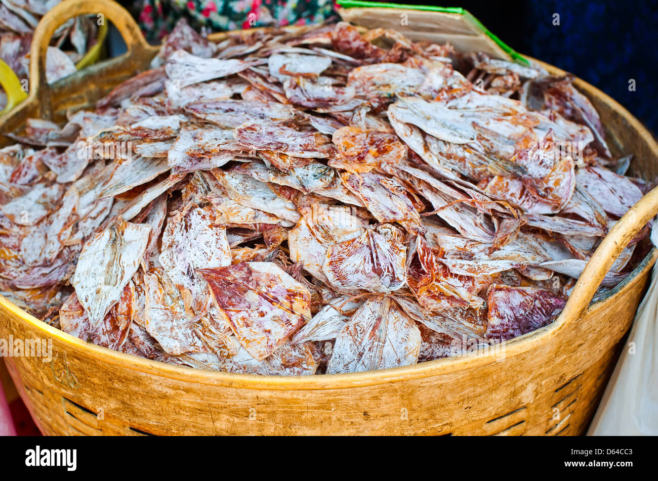Sea food at market. Selling dry calamari in Thailand Stock Photo