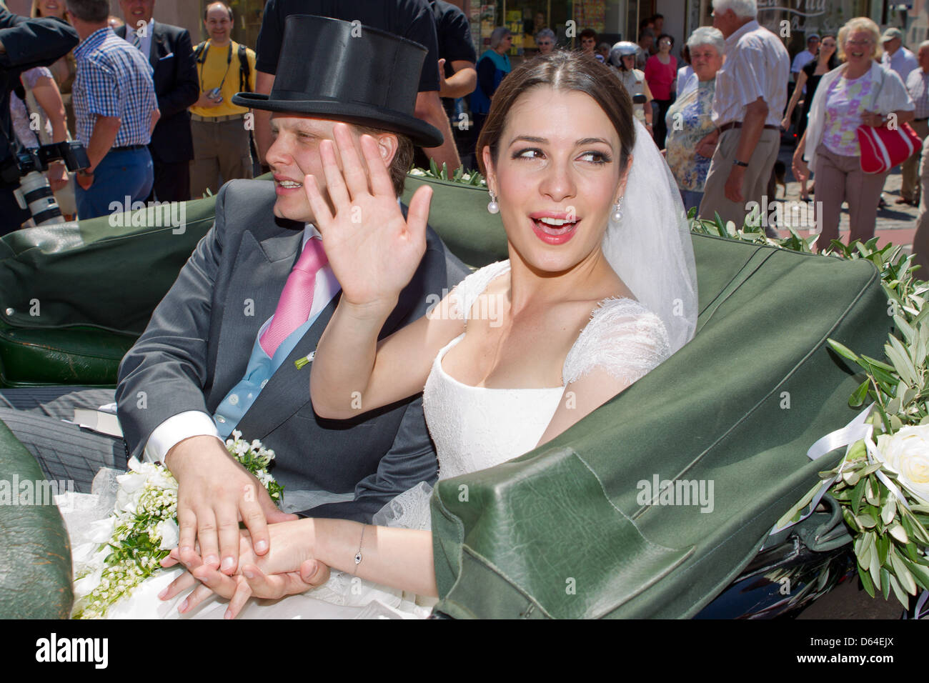 Newly wed Melissa Eliyesil and Count Charles von Faber-Castell drive to the  castle of the Faber-Castell family after the church wedding in Stein near  Nuremberg, Germany, 26 May 2012. Besides relatives and
