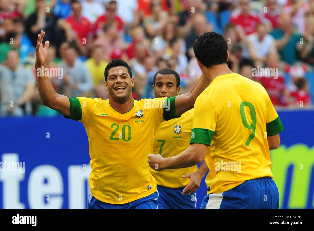 Brazil's Hulk (L) cheers after scoring the 3-0 goal during the international friendly soccer match between Denmark and Brazil at Imtech Arena in Hamburg, Germany, 26 may 2012. Photo: Revierfoto Stock Photo