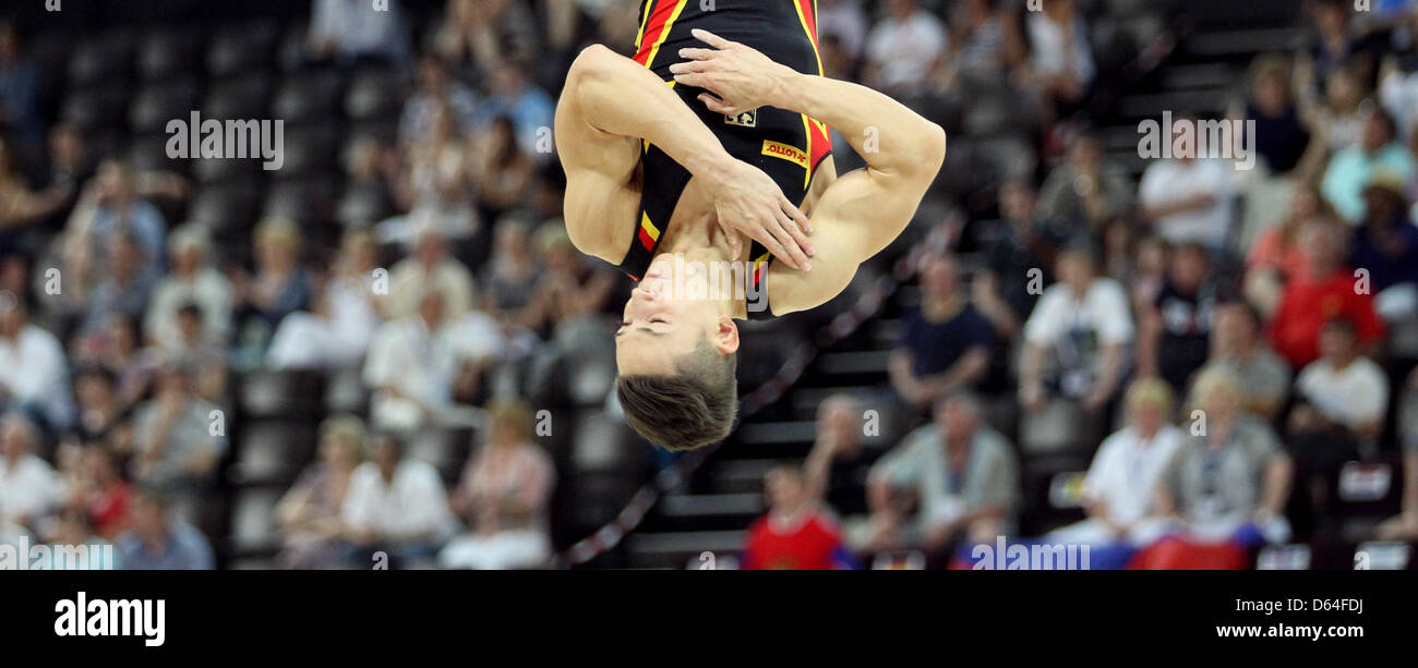 Marcel Nguyen of Germany performs the floor exercises during the Men's European Artistic Gymnastic Championships in Montpellier, France, 26 May 2012. Photo: Friso Gentsch dpa Stock Photo