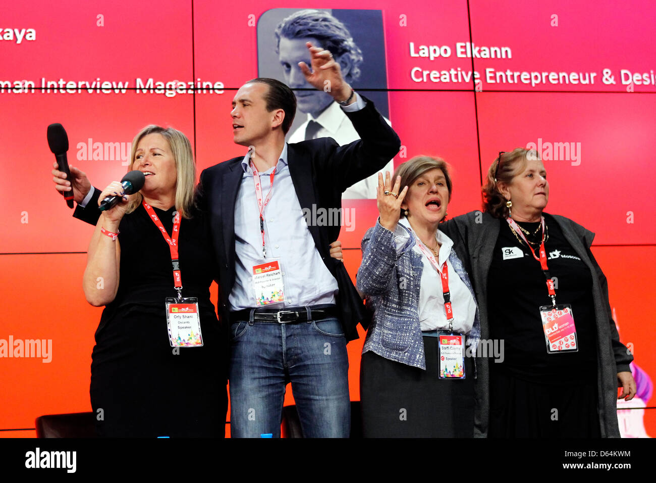 Marcel Reichart, Managing Director and Co-Founder of DLD, Steffi Czerny (2-R), Managing Director at Hubert Burda Media R&D, Orly Shani (L) and Ruthi Koren of OSCAR4B (R) react during the closing ceremony of the DLD Conference 2012 in Moscow, Russia, 29 May 2012. DLD Moscow wants to provide an interdisciplinary platform for international business leaders and experts from media, soci Stock Photo