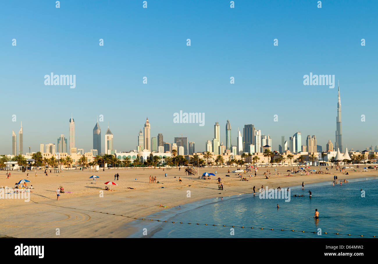 View of modern skyline of Dubai from Jumeirah Open Public Beach in United Arab Emirates UAE Stock Photo