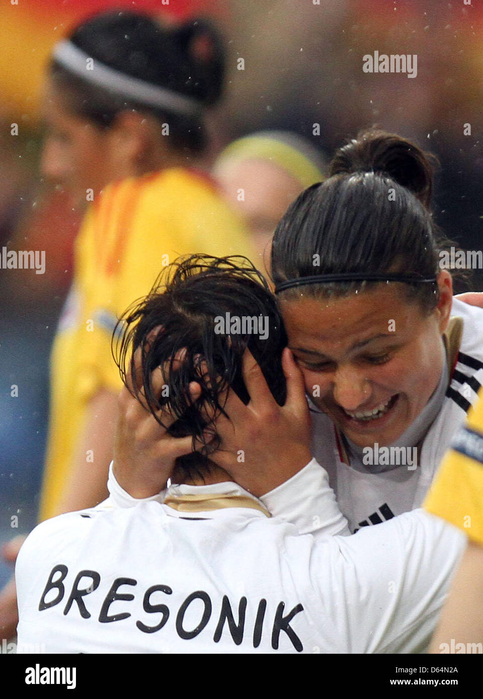 Germany's Linda Bresonik (L) celebrates her 1-0 goal with teammate Dzsenifer Marozsan during the qualification match for the women's European Soccer Championshiop between Germany and Rumania at Schueco Arena in Bielefeld, Germany, 31 May 2012. Photo: OLIVER KRATO Stock Photo