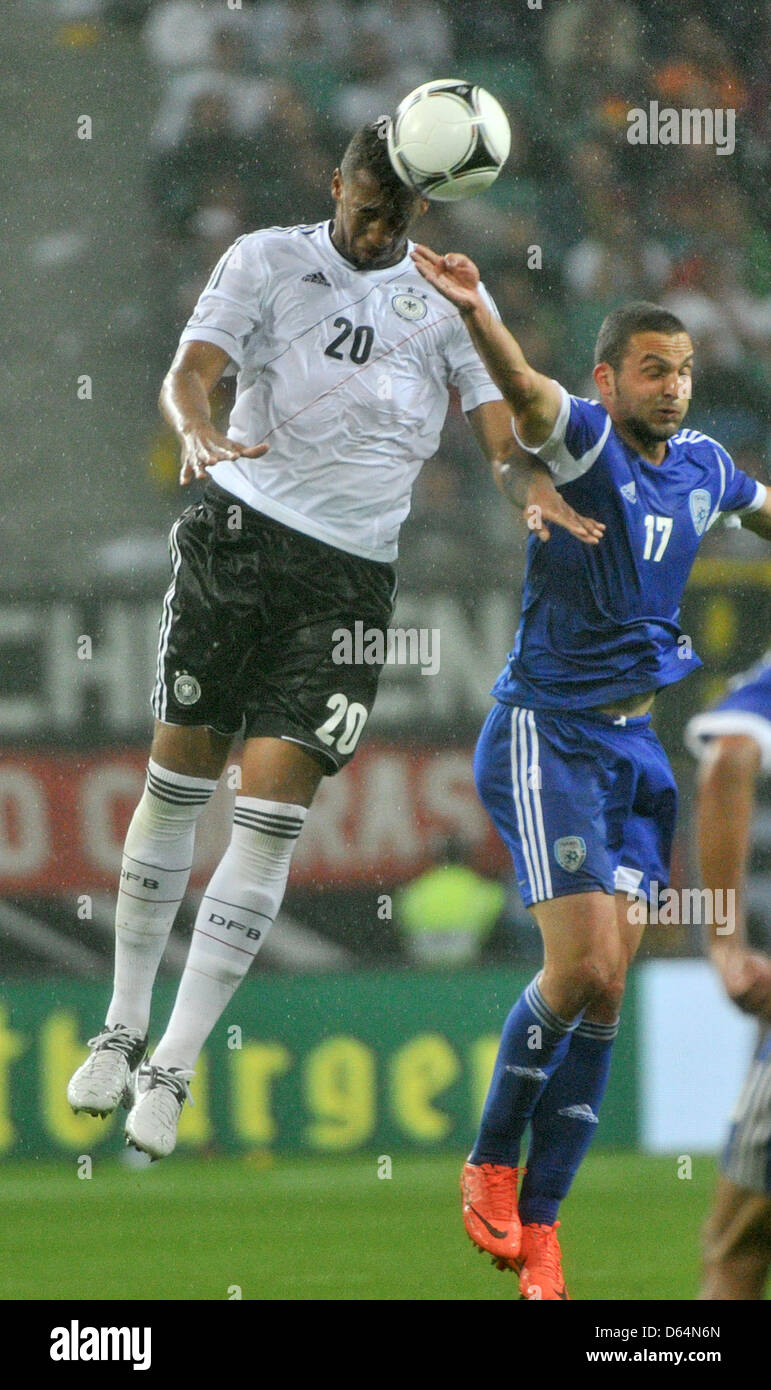 Germany's Jerome Boateng (L) and Israel's Ben Sahar vie for the ball during the international friendly soccer match Germany vs Israel at Red Bull Arena in Leipzig, Germany, 31 May 2012. Photo: Hendrik Schmidt dpa/lsn  +++(c) dpa - Bildfunk+++ Stock Photo