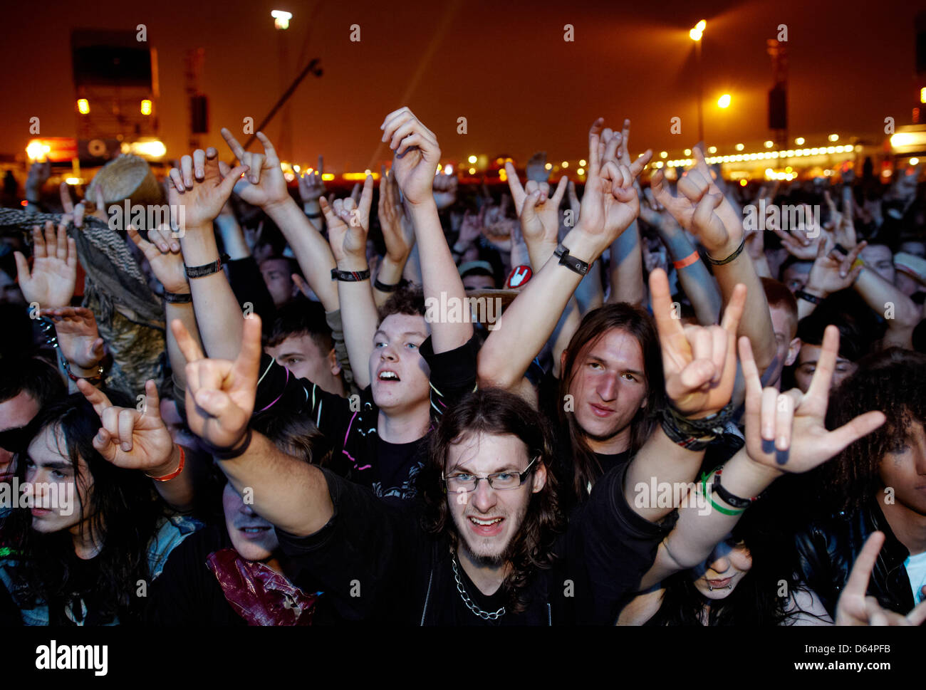 Fans cheer during the concert of the band Motorhead at the Rock am Ring  music festival near Nuerburg, Germany, 02 June 2012. Around 85,000 people  are expected to the three-day festival with