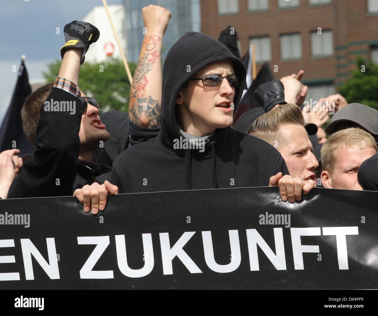 Right-wing demonstrators attend a march at the 'Day of German future' in Hamburg, Germany, 02 June 2012. Several thousands are demonstrating against the neo-Nazi rally. Photo: MARKUS SCHOLZ Stock Photo