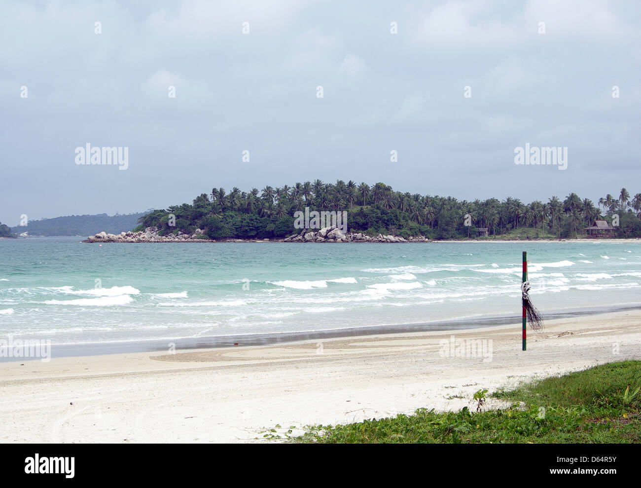 Beach in indonesia and view over the sea to an island Stock Photo