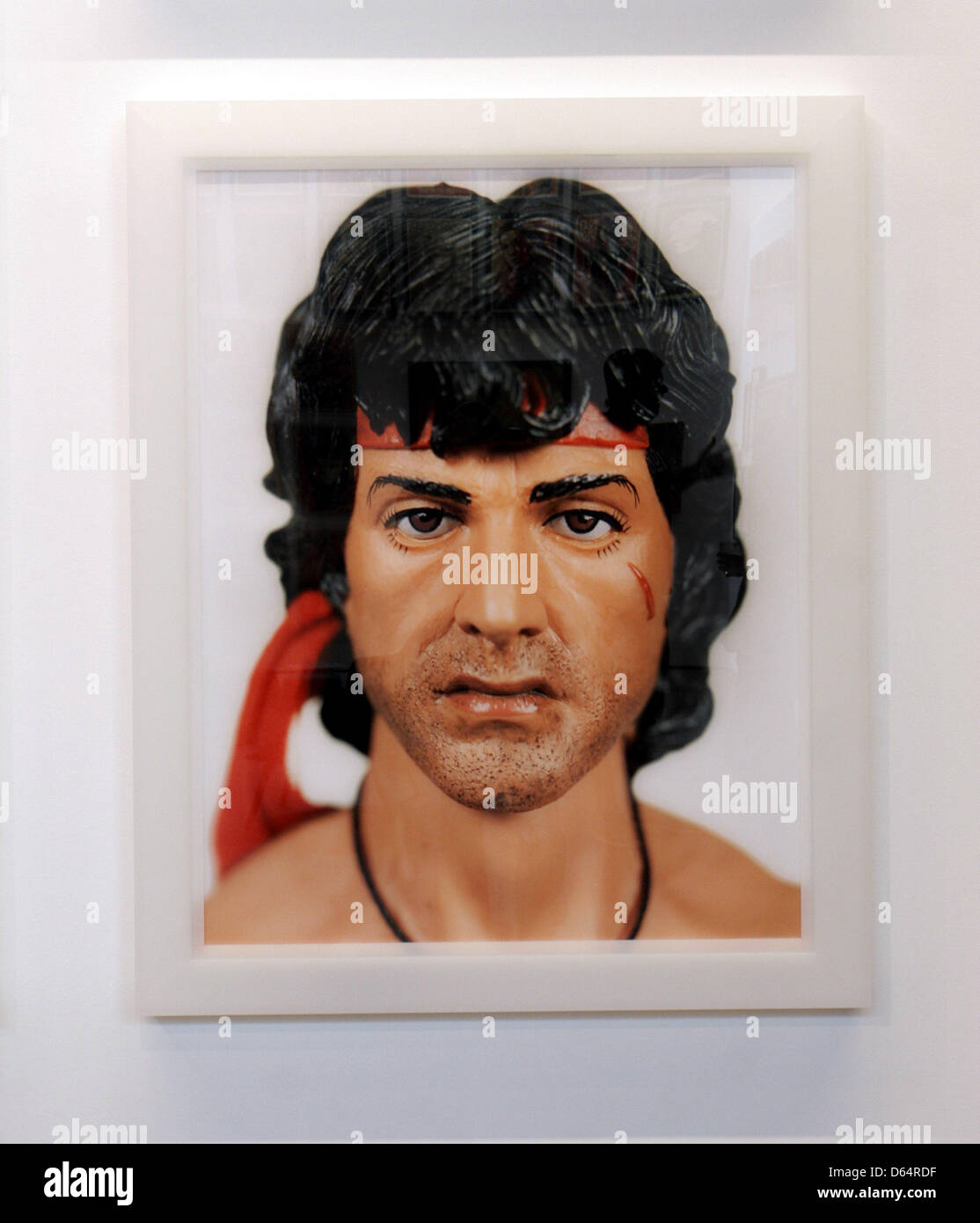 A picture of Sylvester Stallone is featured at the exhibition 'Art & Toys' with items of the collection of Selim Varol at the gallery me Collectors Room in Berlin, Germany, 24 May 2012. Photo: XAMAX Stock Photo
