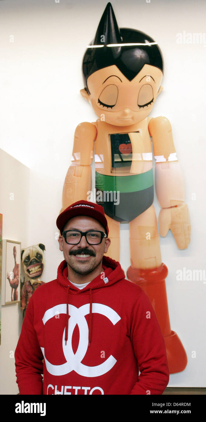 Collector Selim Varol poses in front of the work Astroboy by the artists Daniel & Geo Fuchs at the exhibition 'Art & Toys' consisting of items of the collection of Selim Varol at the gallery me Collectors Room in Berlin, Germany, 24 May 2012. Photo:†XAMAX Stock Photo