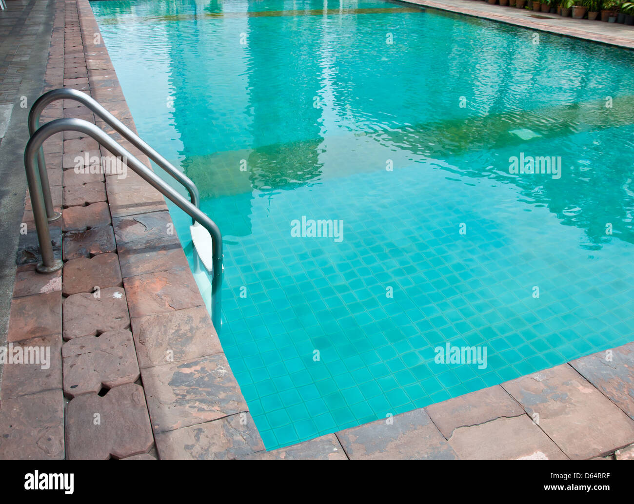 swimming pool in hotel for exercise and relaxation Stock Photo