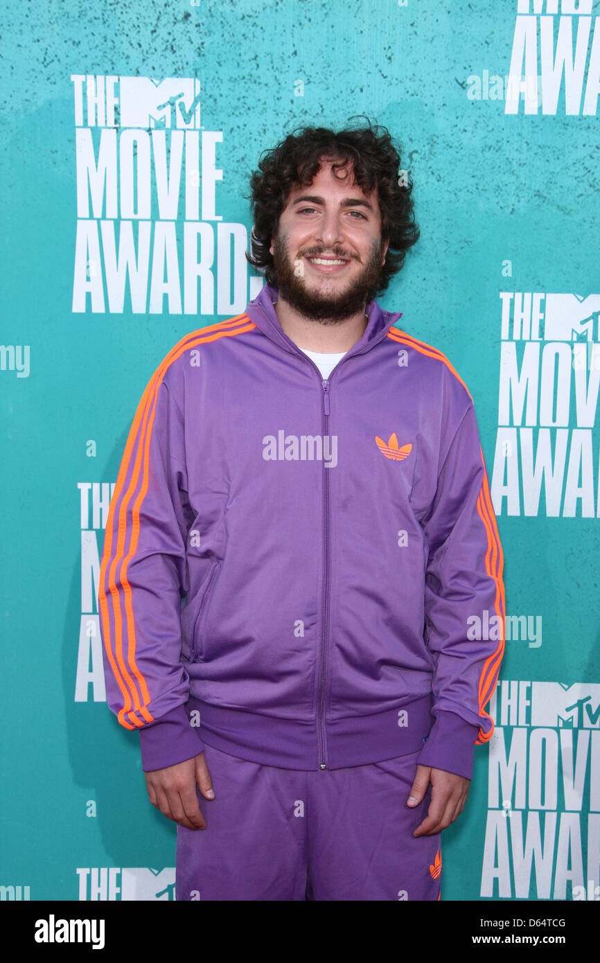 Actor Oliver Cooper arrives on the red carpet of the 2012 MTV Movie
