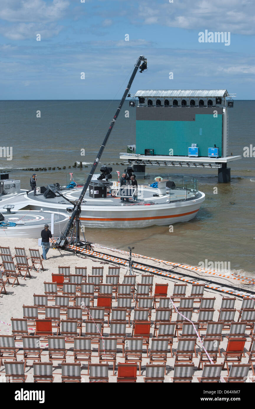 Technicians set up the ZDF sports studio for the live coverage of the UEFA Euro 2012 in Poland and Ukraine at the beach in Heringsdorf, Germany, 05 June 2012. The private beach can only be accessed with a ticket. TV presenter Mueller-Hohenstein and former national goal keeper Kahn, amongst others, will cover the Euro 2012 from Usedom. Photo: STEFAN SAUER Stock Photo