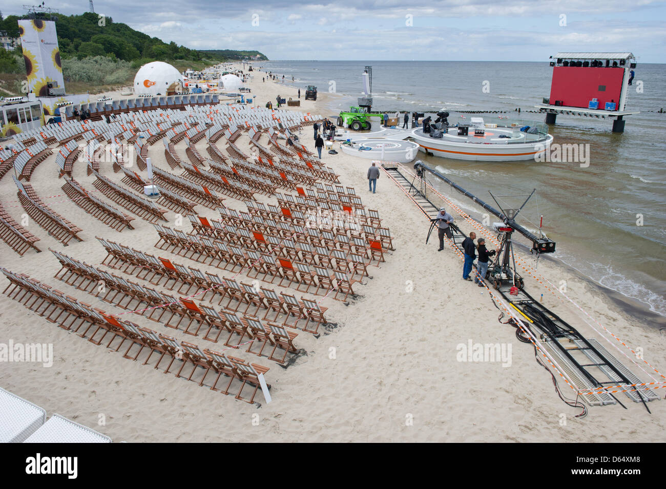 Technicians set up the ZDF sports studio for the live coverage of the UEFA Euro 2012 in Poland and Ukraine at the beach in Heringsdorf, Germany, 05 June 2012. The private beach can only be accessed with a ticket. TV presenter Mueller-Hohenstein and former national goal keeper Kahn, amongst others, will cover the Euro 2012 from Usedom. Photo: STEFAN SAUER Stock Photo