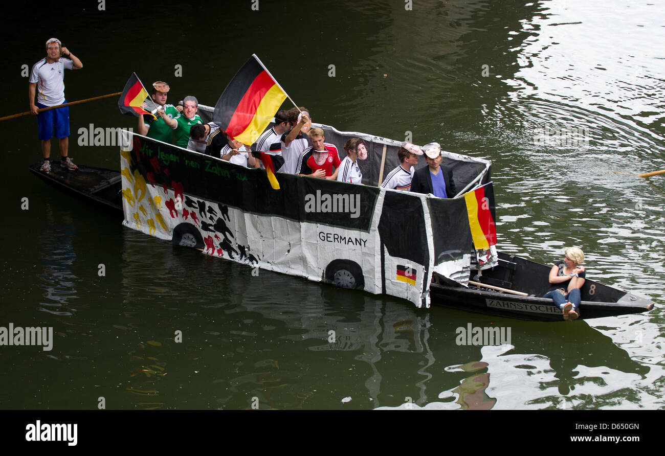Punting boat 'Coach of the German national soccer team' takes part in the fancy dress parade of the punt boat race (Stocherkahnrennen) on the river Neckar in tuebingen, Germany, 07 June 2012. Around 50 punt boats competed in this year's traditional punt boat race. Photo: Marijan Murat Stock Photo