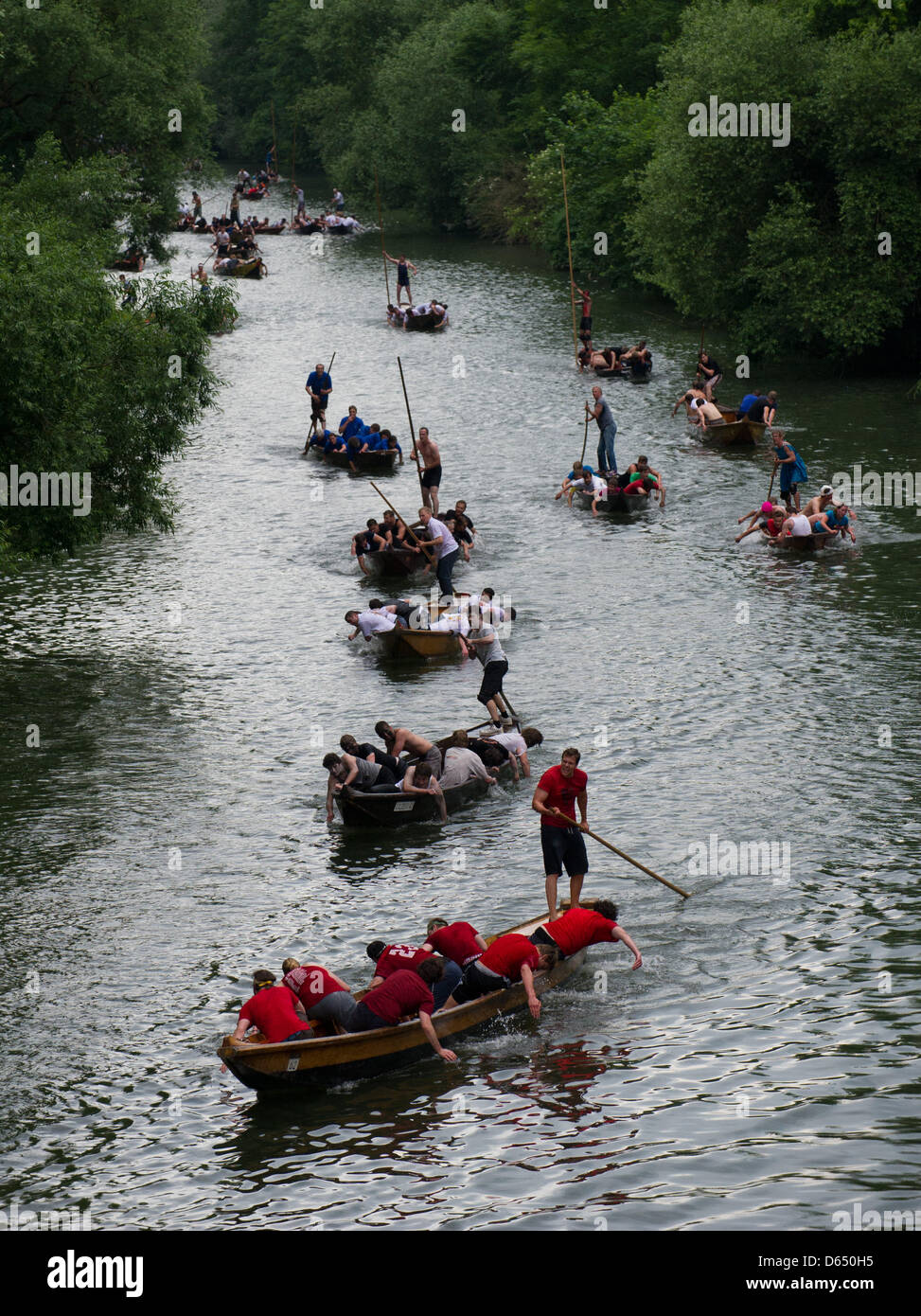 Punt boats compete in a the punt boat race (Stocherkahnrennen) on the river Neckar in Tuebingen, Germany, 07 June 2012. Around 50 punt boats competed in this year's traditional punt boat race. Photo: Marijan Murat Stock Photo