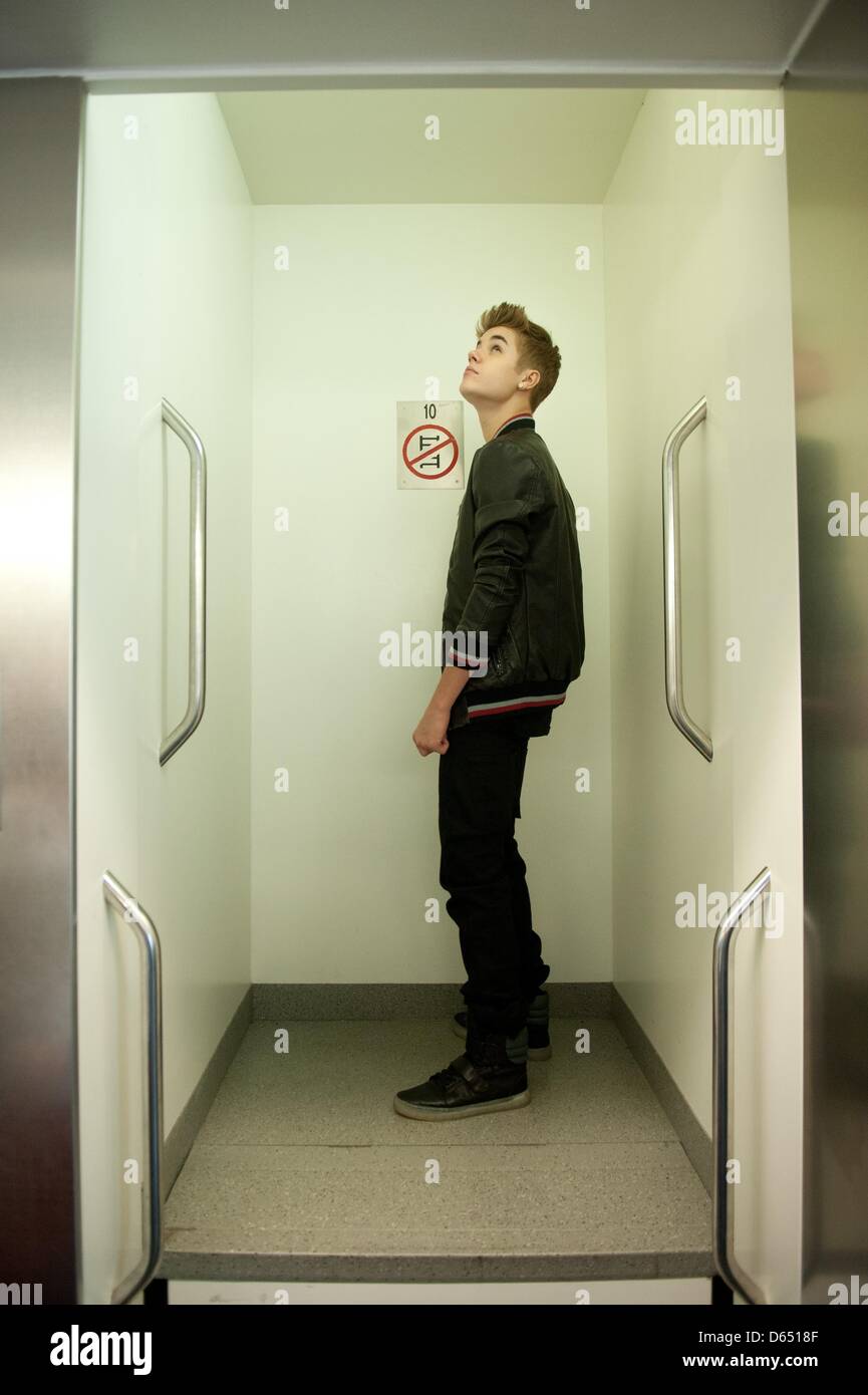 Pop Star Justin Bieber L Rides A Paternoster During His Visit To