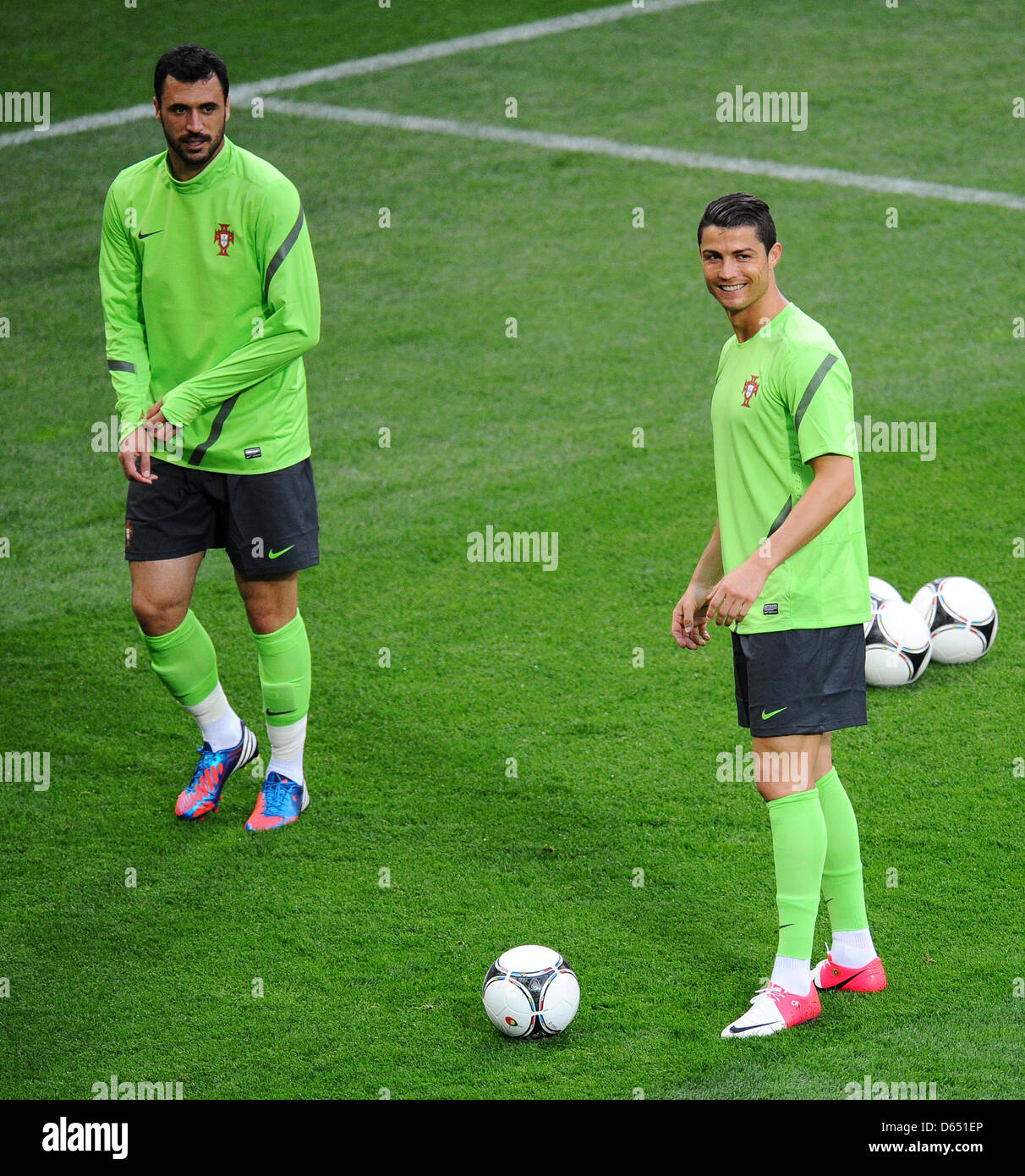 Portugal's Cristiano Ronaldo (R) and Hugo Almeida during a training session of the Portugal national soccer team at Arena Lviv in Lviv, the Ukraine, 08 June 2012. Photo: Thomas Eisenhuth dpa (Please refer to chapters 7 and 8 of http://dpaq.de/Ziovh for UEFA Euro 2012 Terms & Conditions)  +++(c) dpa - Bildfunk+++ Stock Photo