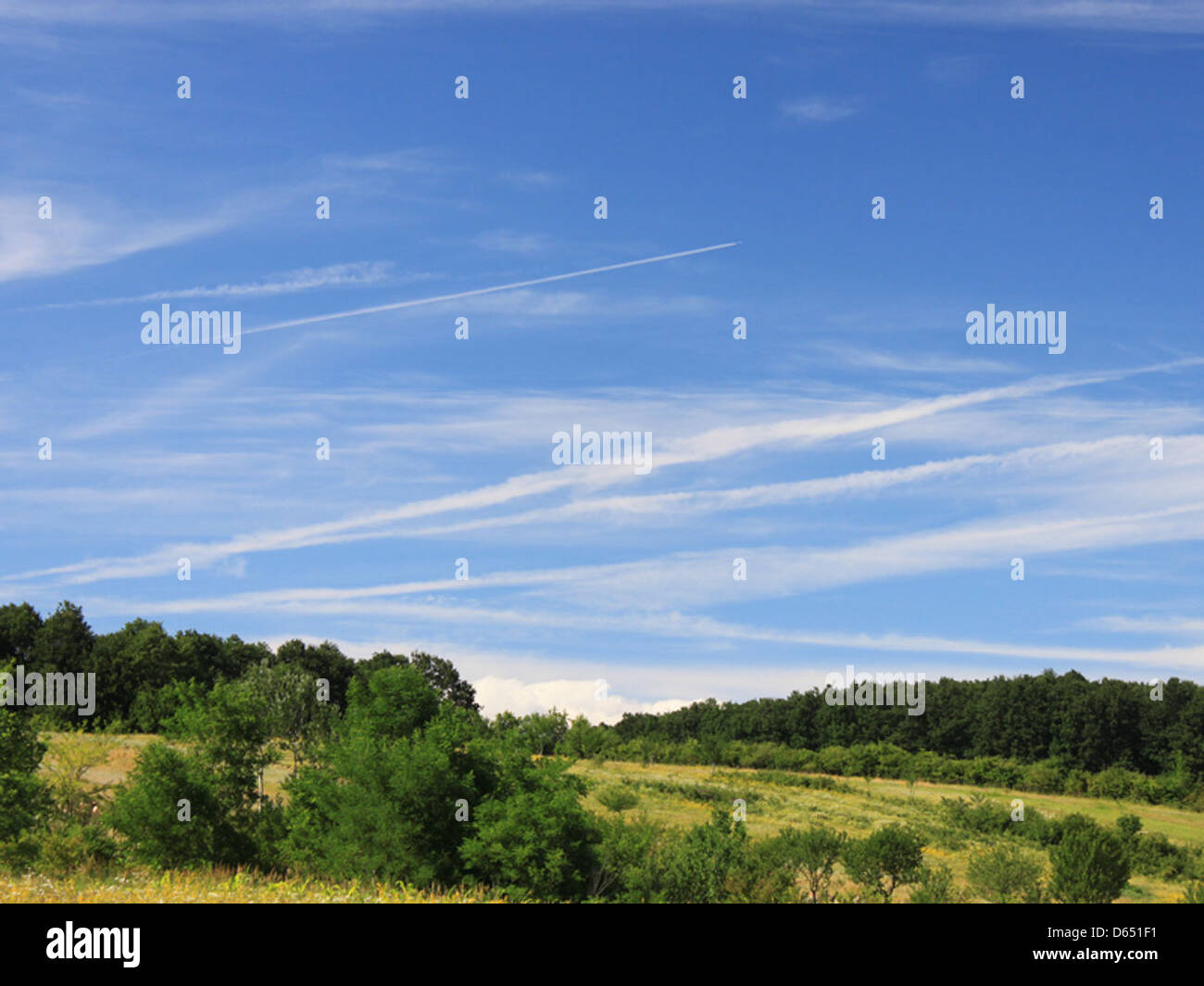 Plane-Trails-Cloudy-Blue-Sky Evening  IMG 3621 Stock Photo