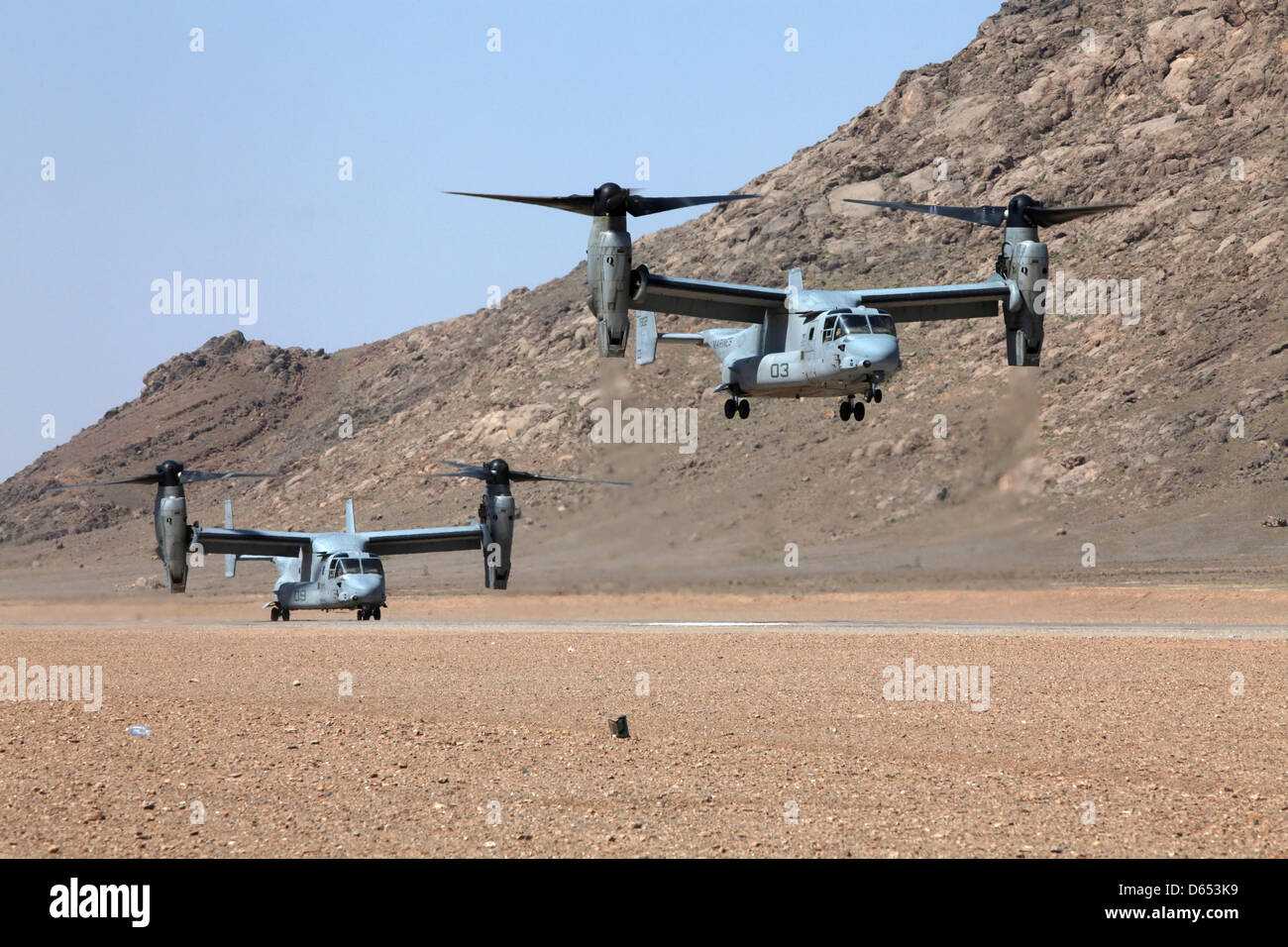 US Marine Corps MV-22B Osprey aircraft with Marine Medium Tiltrotor Squadron 264 landing to pick up troops during an operation April 11, 2013 in Helmand province, Afghanistan. Stock Photo