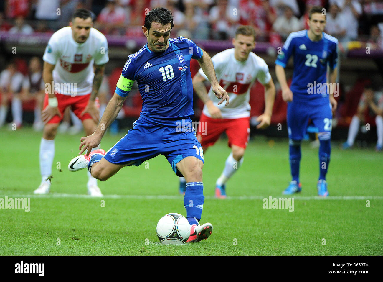 Greece's Giorgos Karagounis performs a penalty kick during the UEFA Euro 2012 match between Poland and Greece at the national stadium in Warsaw, Poland, 08 June 2012. Photo: Pressfocus / Revierfoto Stock Photo
