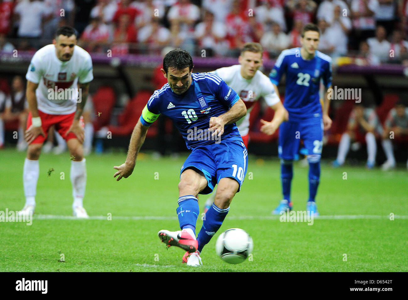 Greece's Giorgos Karagounis performs a penalty kick during the UEFA Euro 2012 match between Poland and Greece at the national stadium in Warsaw, Poland, 08 June 2012. Photo: Pressfocus / Revierfoto Stock Photo