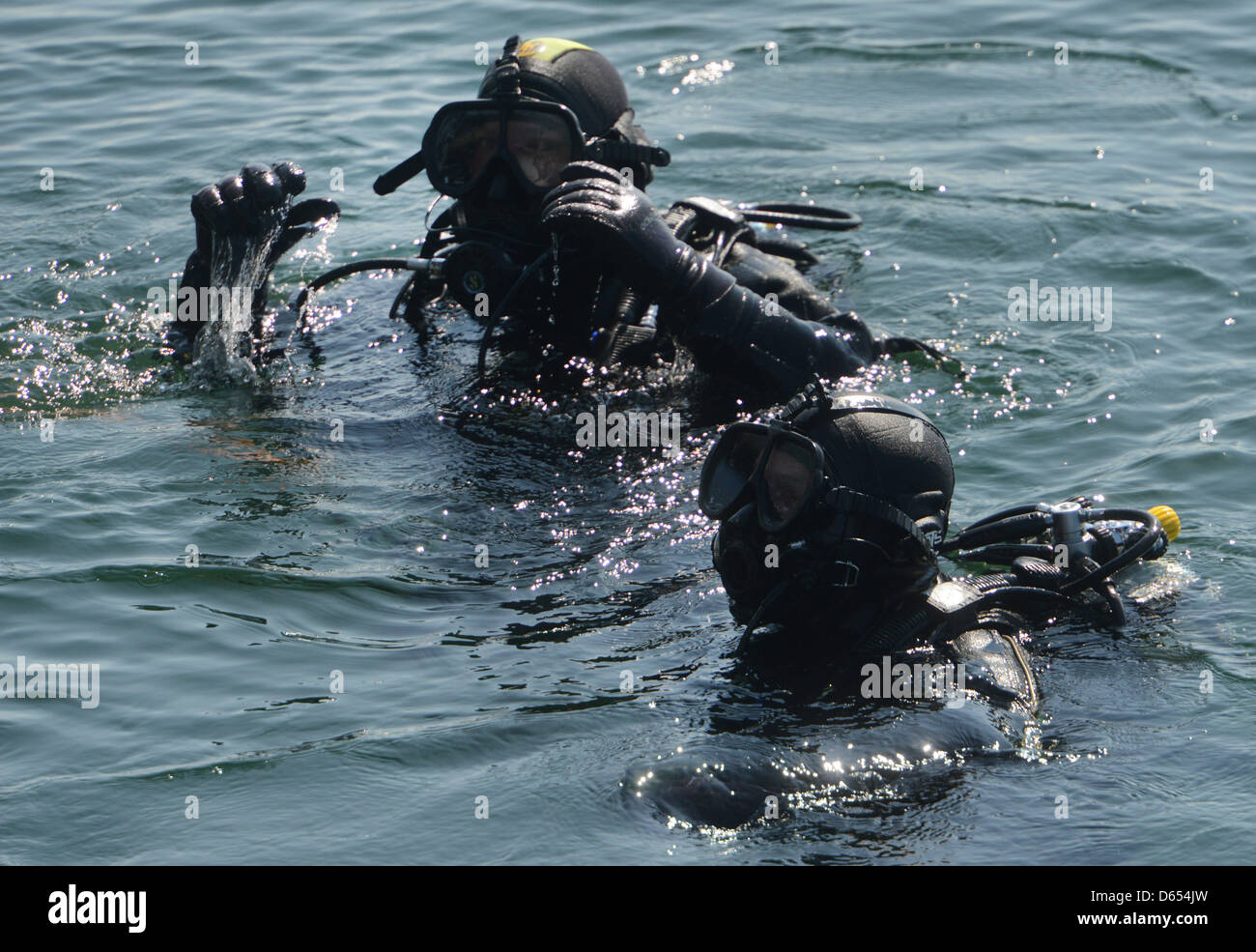 Divers of the German Armed Forces start a dive to the dive fighter