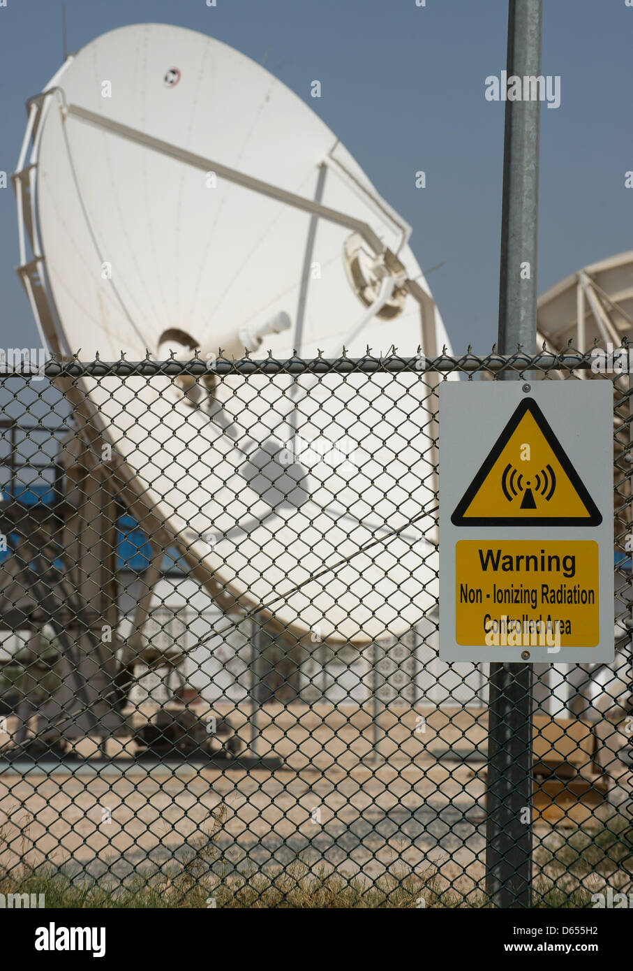 Giant satellite dishes stand on the premises of the Arabic news