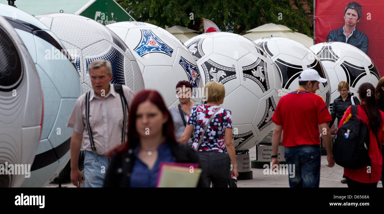 Official match balls of the UEFA European Football Championships from 1984 until 2012 (R-L) are lined up in the center of Gdansk, Poland, 12 June 2012. The EURO 2012 runs from 08 June till 01 July and takes place in Poland and the Ukraine. Photo: Jens Wolf dpa Stock Photo