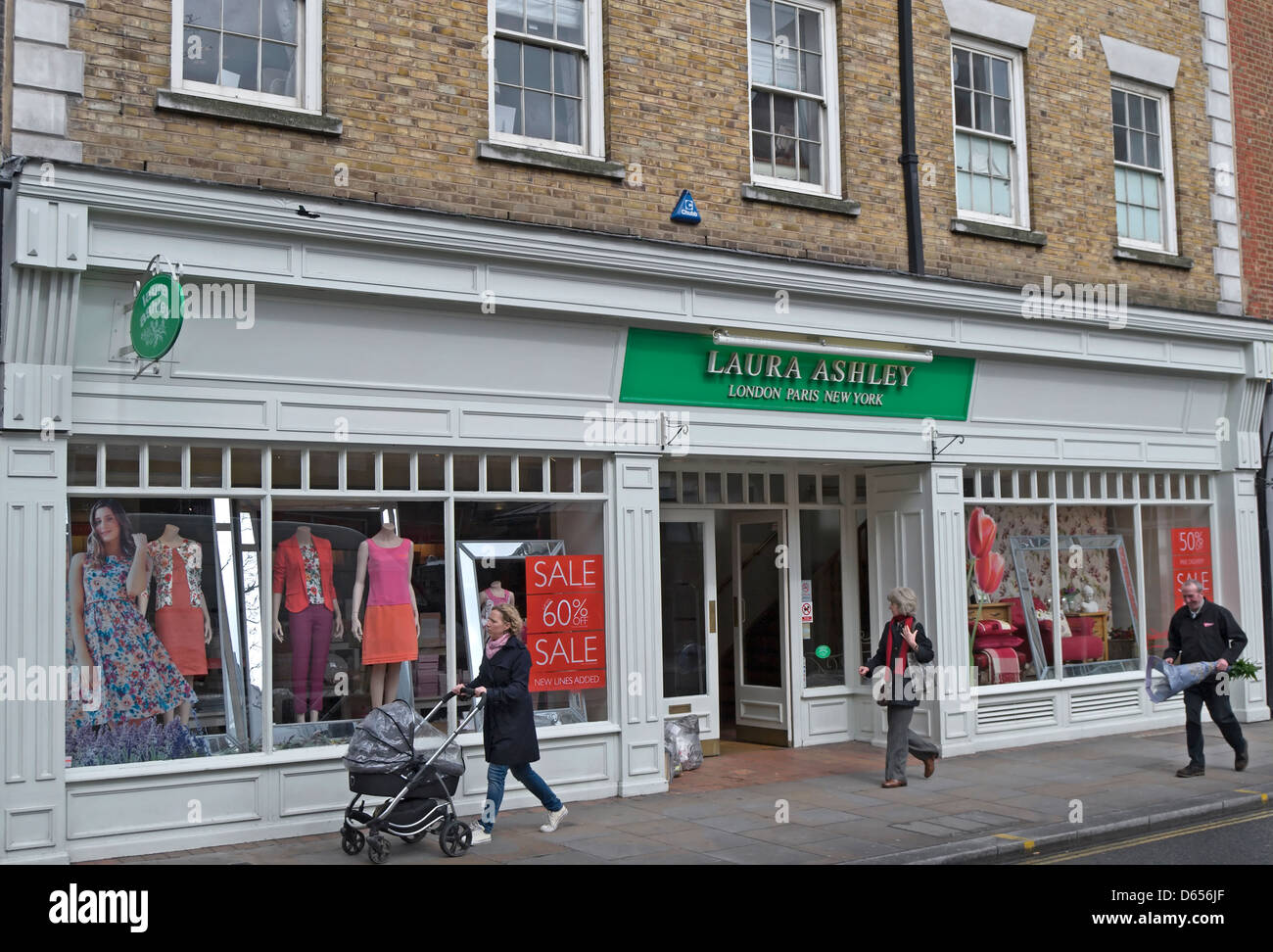 pedestrians pass a branch of the retailer laura ashley, richmond upon thames, surrey, england Stock Photo