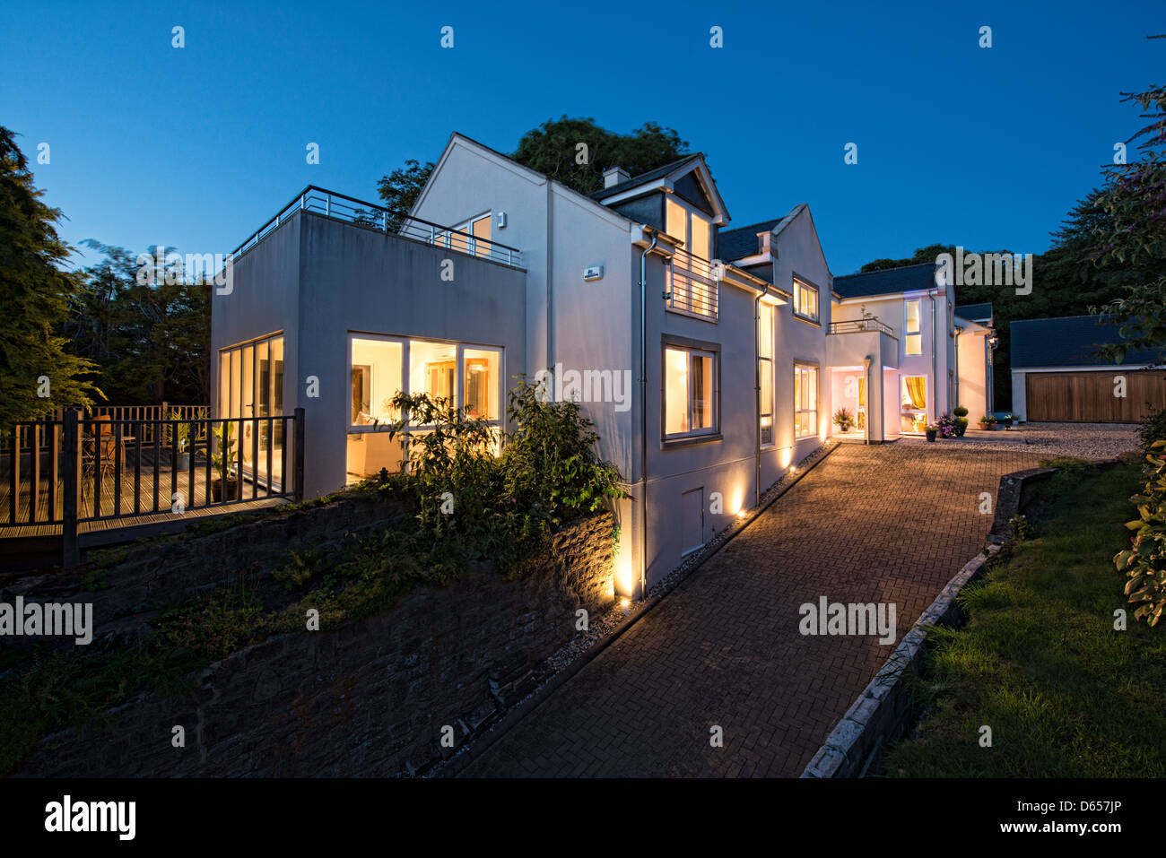 A large home at dusk Stock Photo