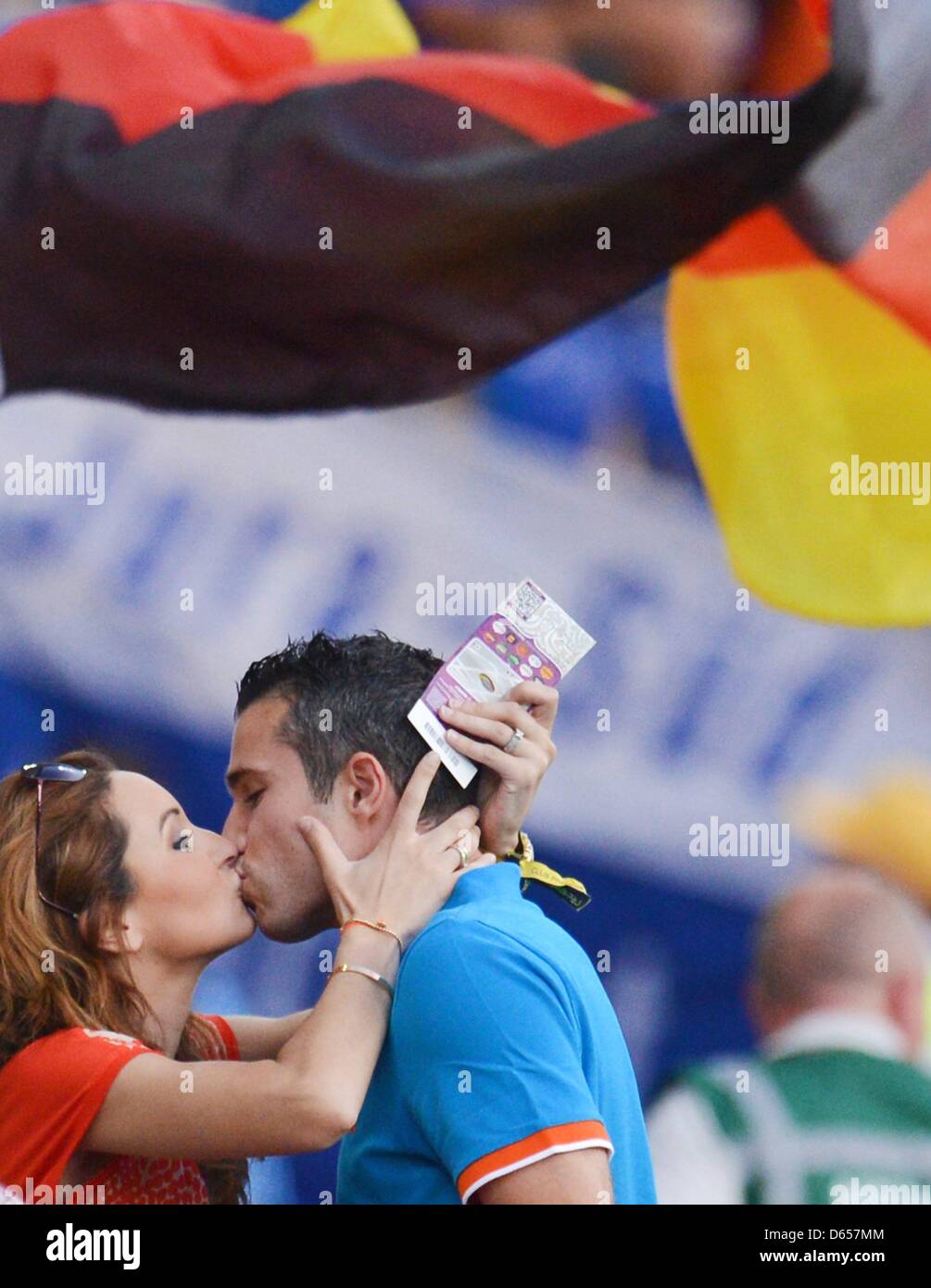 The Netherlands Robin van Persie and his wife Bouchra kiss before UEFA EURO 2012 group B soccer match Netherlands vs Germany at Metalist Stadium in Kharkiv, the Ukraine, 13 June 2012 pic